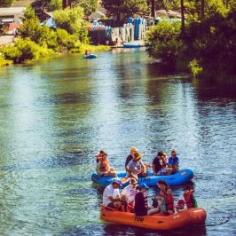 a group of people on a boat in the water