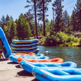 a person riding on the back of a boat