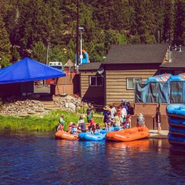 a group of people on a boat in the water